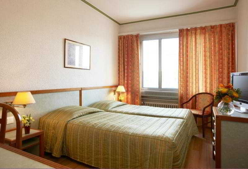 Hotel Suisse Genf Zimmer foto